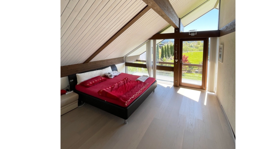 Modernes Einfamilienhaus (HUF-Haus) in Traumlage unweit der Kössener Ache mit herrlichem Bergblick - Schlafzimmer