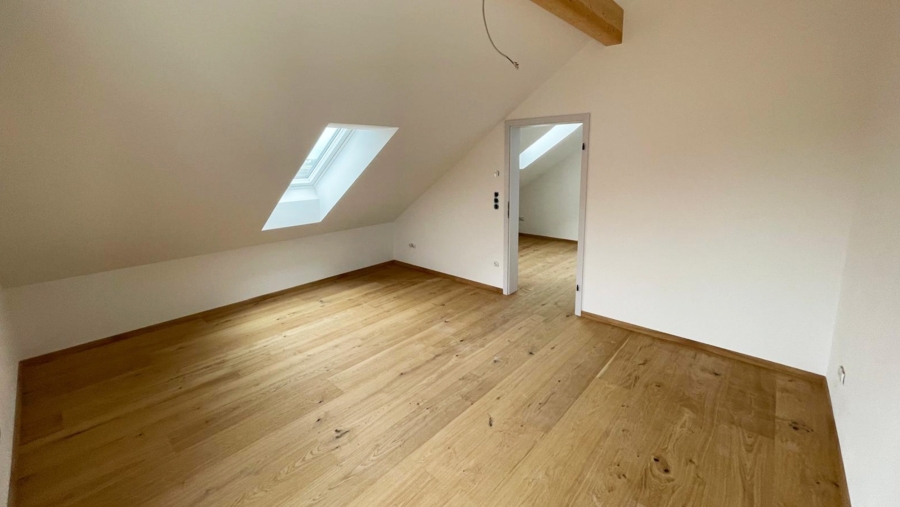 Moderne Neubau-Doppelhaushälfte in sehr ruhiger Wohnlage im Herzen von Gelting zum Erstbezug - Studio im Dachgeschoss