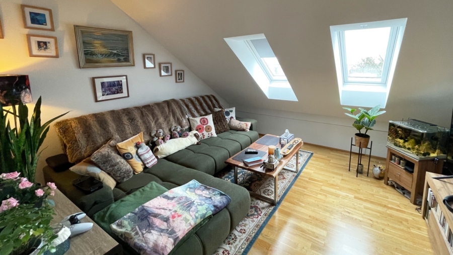 Topzustand! 3-Zimmer-Dachterrassenwohnung mit Einbauküche, TG-Stellplatz & idealer Südausrichtung - Wohnbereich