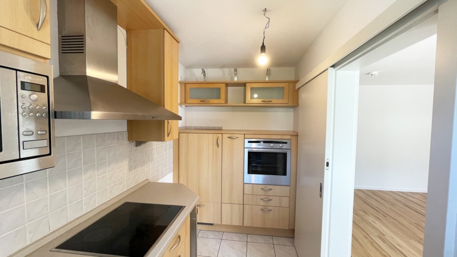 Schöne 3-Zimmer-Gartenwohnung mit 2 Bädern, Einbauküche und großer Garage in sehr ruhiger Wohnlage! - Küche Ansicht 2