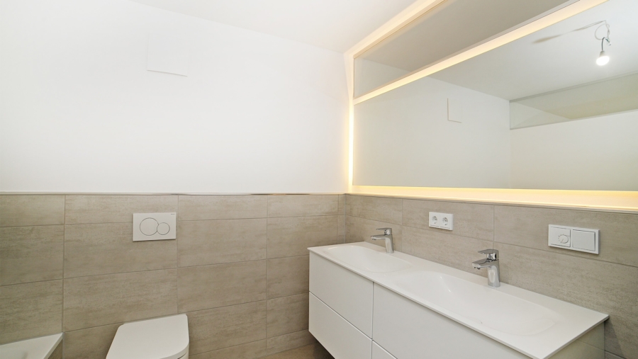 Wohntraum auf 4 Zimmer! Exklusive Neubau-Eigentumswohnung im Zentrum von Eichenried - Badezimmer