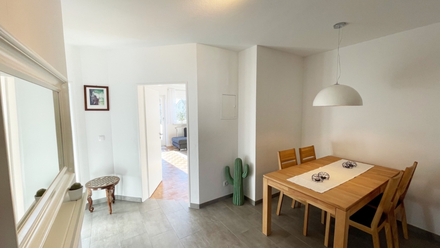 Top geschnittene 3-Zimmer-Eigentumswohnung mit Südbalkon & Gartenmitbenutzung in Alt-Poing - Essbereich